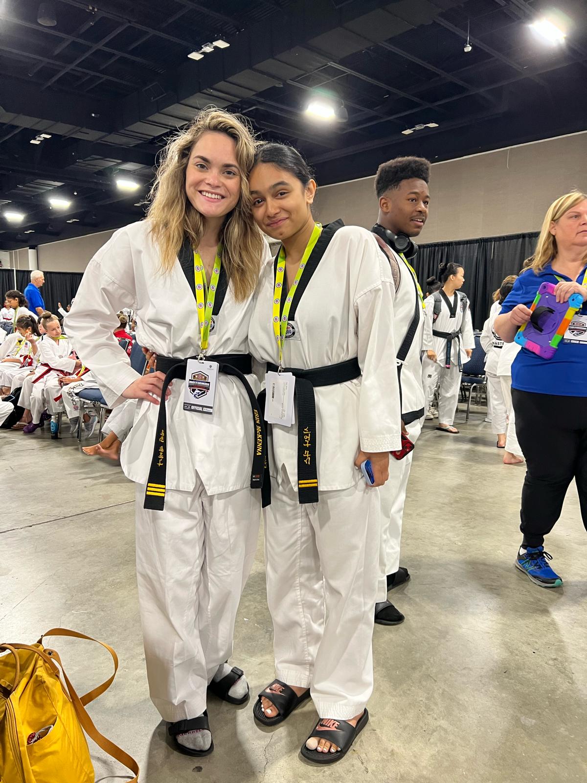 Siona with supporters or fellow martial-art participants.