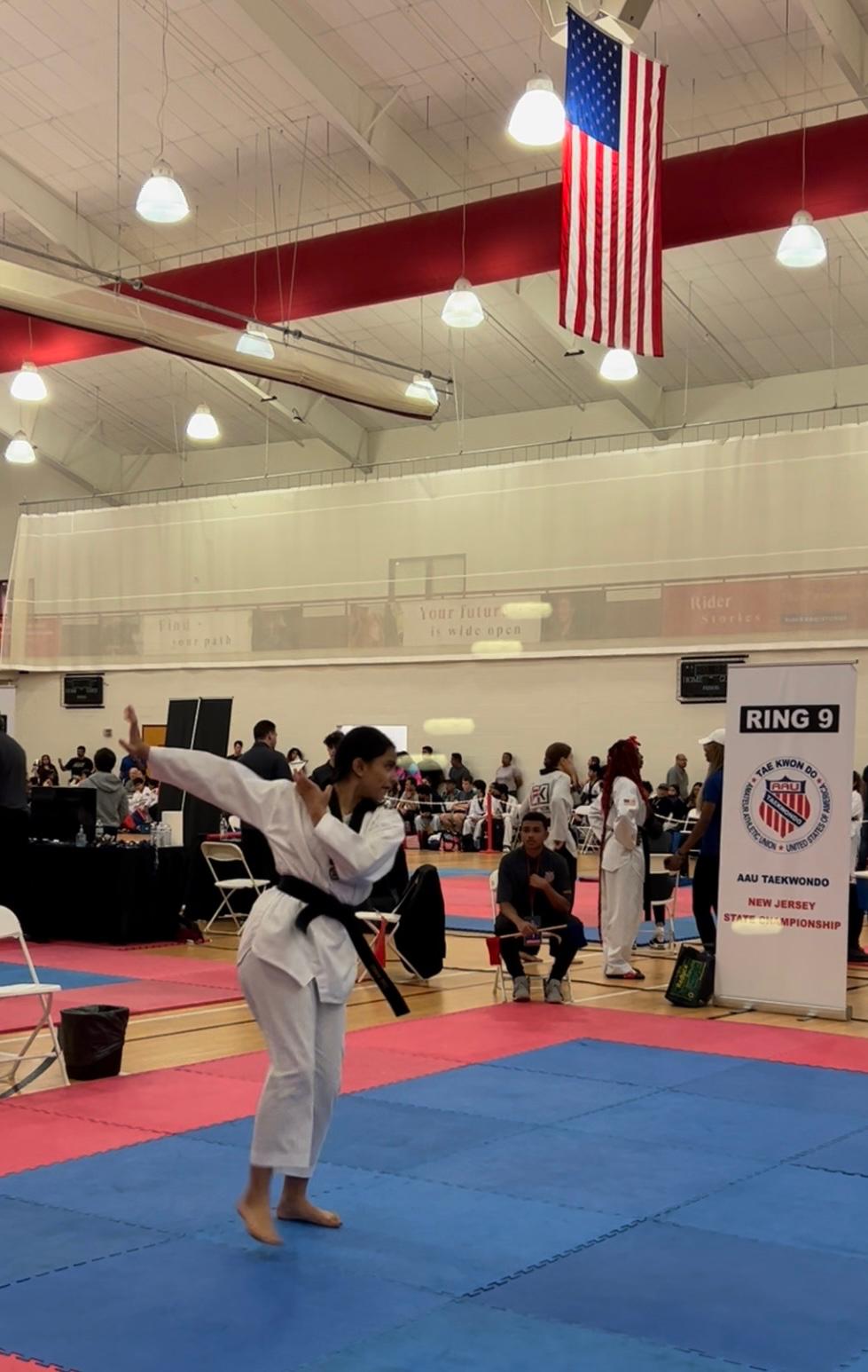 A focused martial-arts performance during competition.